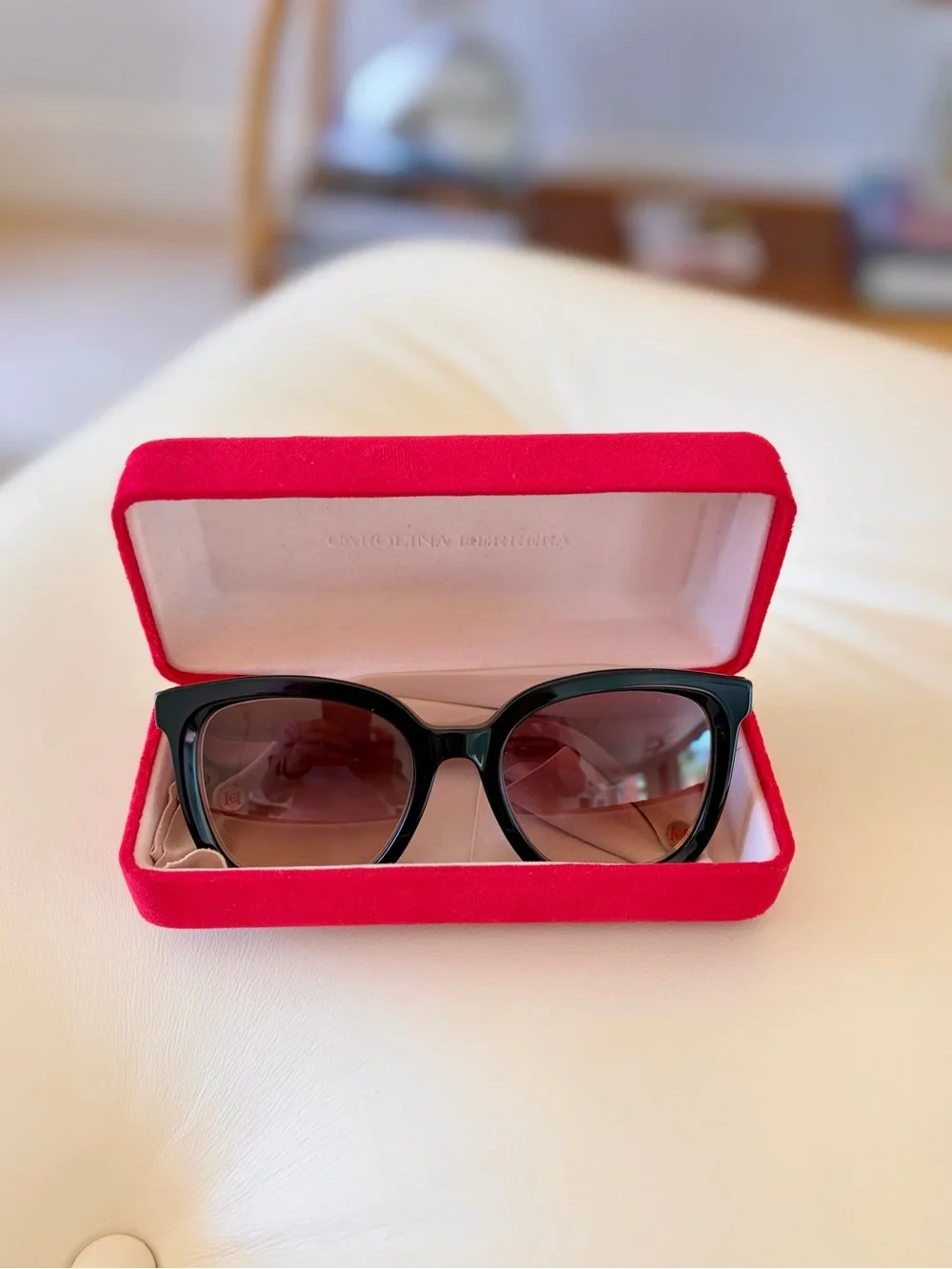 Carolina Herrera designer sunglasses.